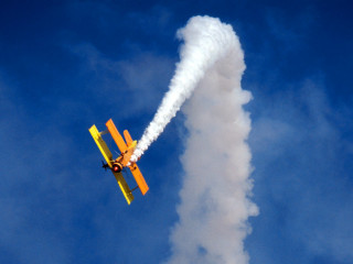 Plane flying sky smoke trail - alson s. clark free wallpaper