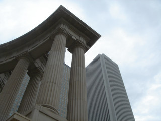 Tall building large pillars sky 4 - an art deco sculpture free wallpaper