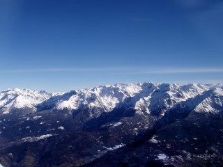 Mountain range airplane window blue - matte painting free wallpaper