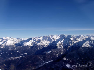 Mountain range airplane window blue 5 - matte painting free wallpaper