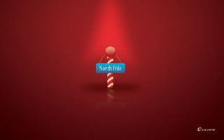 Person holding sign north pole 2 - it in front free wallpaper