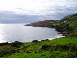 Large body of water green - hillside free wallpaper