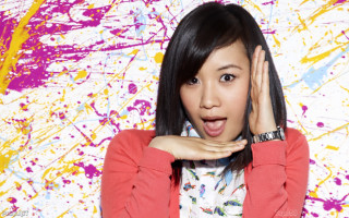 Surprised woman colorful background paint - paint splatter free wallpaper