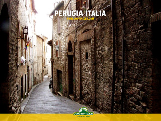 Narrow alley cobblestone street buildings 5 - a yellow border free wallpaper