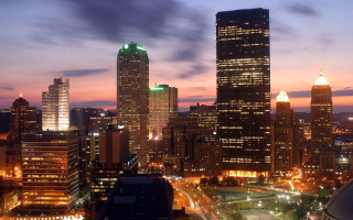 City skyline night tall buildings 11 - a green light free wallpaper