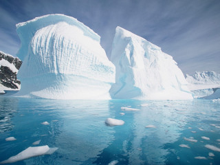 Iceberg floating ocean mountain range 3 - ice free wallpaper