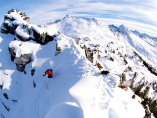 Skier skiing steep mountain snow - steep free wallpaper