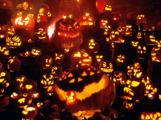 Glowing pumpkins carved faces dark - charles codman free wallpaper