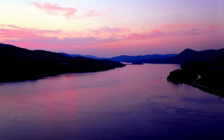 River boat sunset mountains distance - river free wallpaper