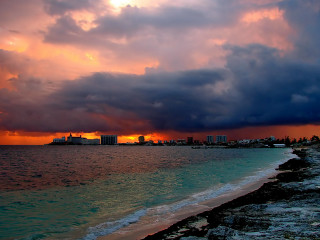 Sunset beach city clouds water 3 - colorful cloud free wallpaper