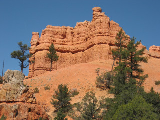 Large rock formation trees blue 2 - a large rock formation free wallpaper