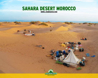 Group sitting sand tent desert - near free wallpaper