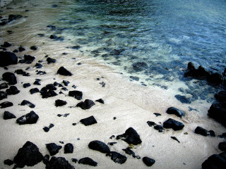 Beach rocks water white sand - free bikini wallpaper