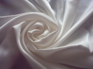 White fabric large circular design - center piece free wallpaper