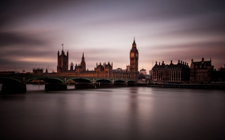 Large building clock tower river - a bridge in front free wallpaper