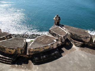 Stone wall ocean clock tower 3 - a clock tower free wallpaper