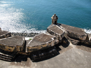 Stone wall clock tower ocean - a stone wall free wallpaper