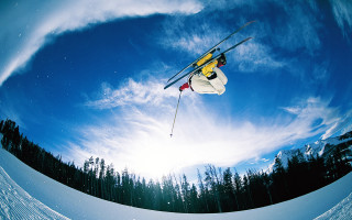 Skier midair jump snow trees 2 - dave allsop free wallpaper