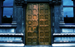 Large wooden door nighttime clock - the wall and a clock free wallpaper