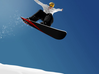 Snowboarder air trick snow blue - a blue sky background free wallpaper