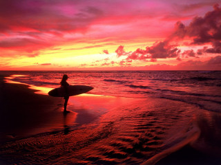 Person holding surfboard beach sunset 2 - a person holding free wallpaper