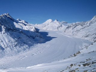 Skier snowy mountain slope view - a view free wallpaper