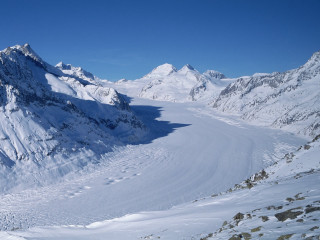 Skier snowy mountain slope blue - a snowy mountain free wallpaper