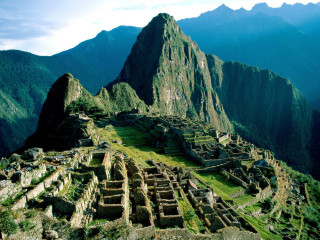 Mountain tall background grassy area 2 - a few building free wallpaper