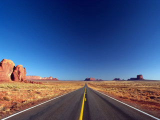 Long road yellow line desert 3 - a long road free wallpaper