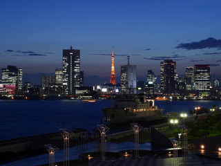 City skyline boat nighttime lights - epsylon point free wallpaper
