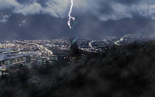 Lightning bolt city nighttime sky - over a city free wallpaper