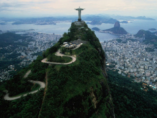 City view mountain statue high 2 - a view of a city free wallpaper