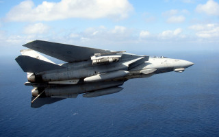 Fighter jet ocean sunny day - over the ocean free wallpaper