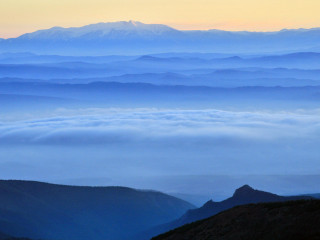 Mountain range clouds sunset distance - a view of the mountains free wallpaper