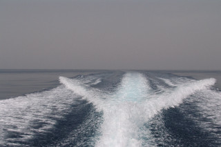 Boat ocean cloudy wake white - widescreen free wallpaper