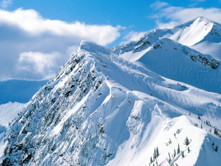 Snowy mountain sky clouds background - the side of the mountain free wallpaper