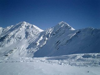 Skier snowy mountain slope mountain - ski free wallpaper