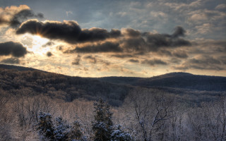Mountain sun clouds trees snow 2 - the foreground and a snow free wallpaper