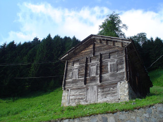 Wooden building hillside forest trees 2 - a wooden building free wallpaper