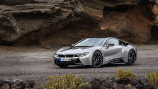 Silver car rocky cliff rock - a silver car free wallpaper