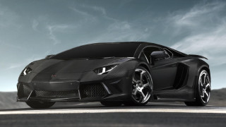 Black sports car driving down - matte finish free wallpaper