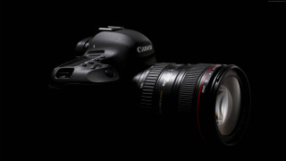 Camera lens attached lens cap - a len free wallpaper