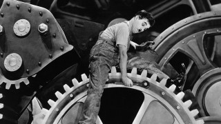 Man working machine factory gears - mechanical free wallpaper