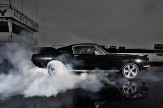 Black car smoke tires wet - a black car free wallpaper