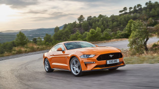 Orange mustang driving mountains trees - orange free wallpaper