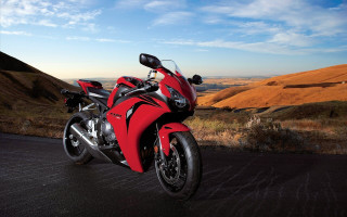 Red motorcycle road hill blue - a red motorcycle free wallpaper