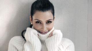 Woman ponytail white sweater smiling - a white sweater free wallpaper