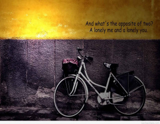 Bicycle parked against wall quote - against a wall free wallpaper