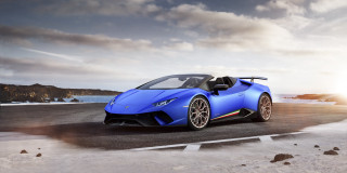 Blue sports car ocean sunset - a road near the ocean free wallpaper