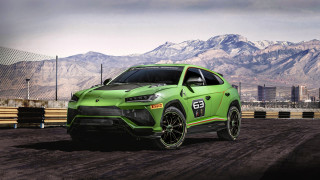Green sports car mountain range - a green sports car free wallpaper
